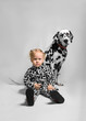 Little girl and Dalmatian dog